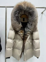 Detail view focusing on the zip-front closure and stitched puffer channels, showing a smooth shell finish and structured padding.