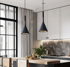 Nordic-style pendant lights provide focused dining room illumination
