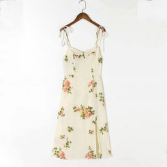 Sleeveless chiffon midi dress with spaghetti straps, lace-up back, and printed pattern. 3