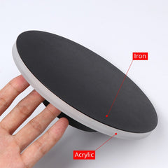 A circular acrylic LED wall-mounted light with a touch switch, black iron  and acrylic body finger touch.